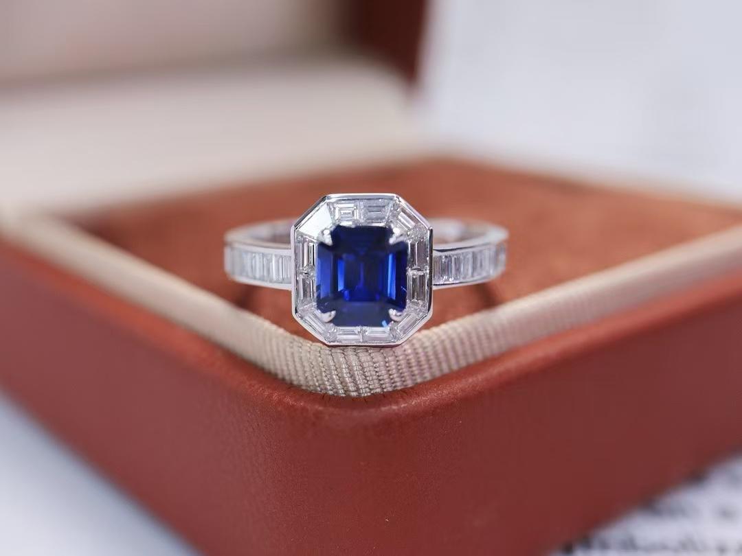 1.09 Carat Non-Heated Vivid Blue Sapphire Diamond Cocktail Ring 18K White Gold 

Main stone - 1.09 CT
Diamonds - 0.6 CT 
Total Weight - 2.49 GM

Premium Sapphire: Features a non-heated, emerald-cut sapphire with deep, vivid blue color.
Elegant