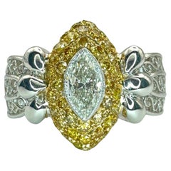 Bague en diamant blanc et diamant jaune 18k de taille marquise Nord-Sud