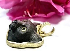 Colgante de cabeza de gato de obsidiana de 18 quilates con argolla de 18 quilates