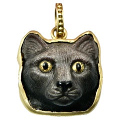 Colgante de cabeza de gato de obsidiana de 18 quilates con argolla de 18 quilates