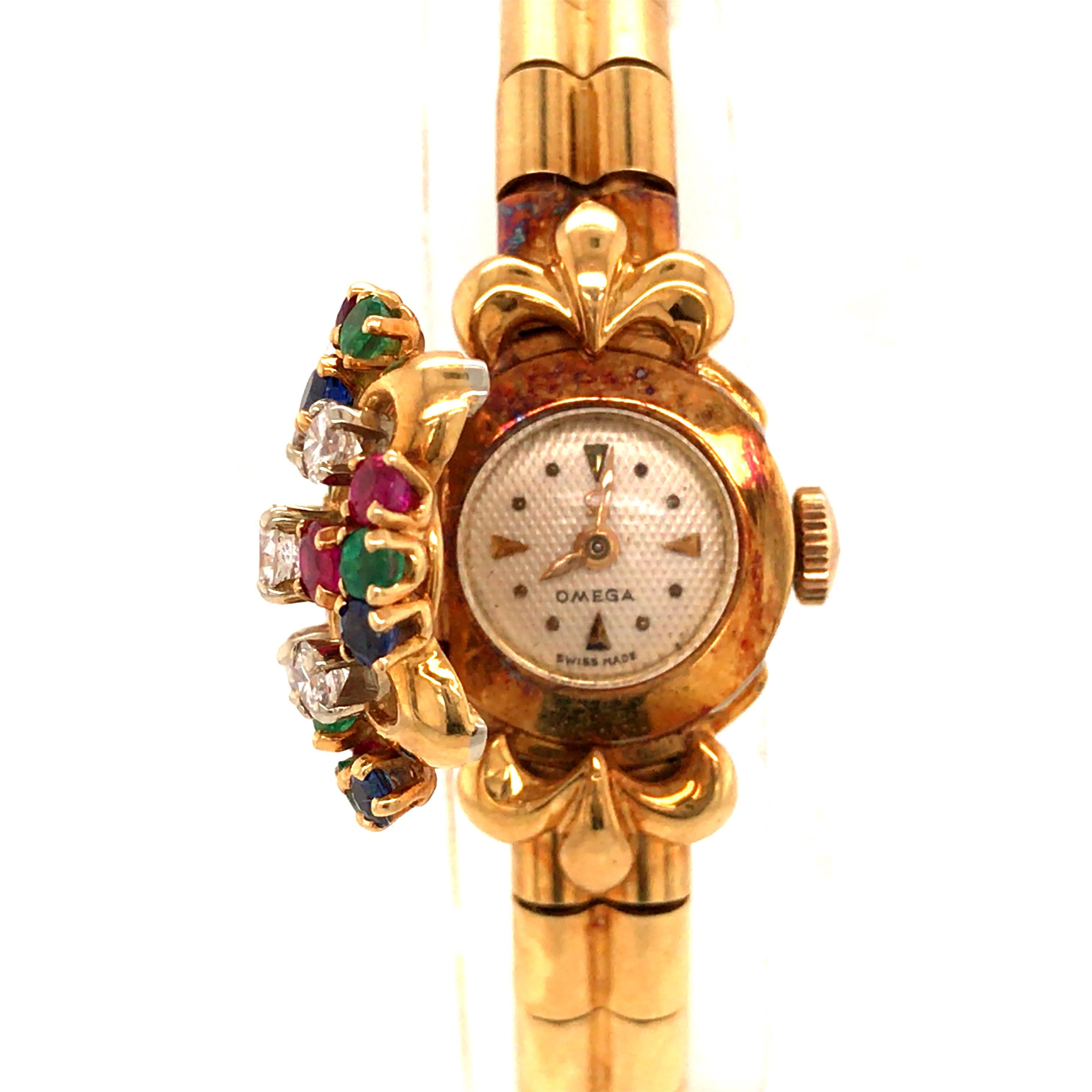 18 Karat Omega Vintage Ladies Diamond and Gemstone Covered Watch Yellow Gold 2