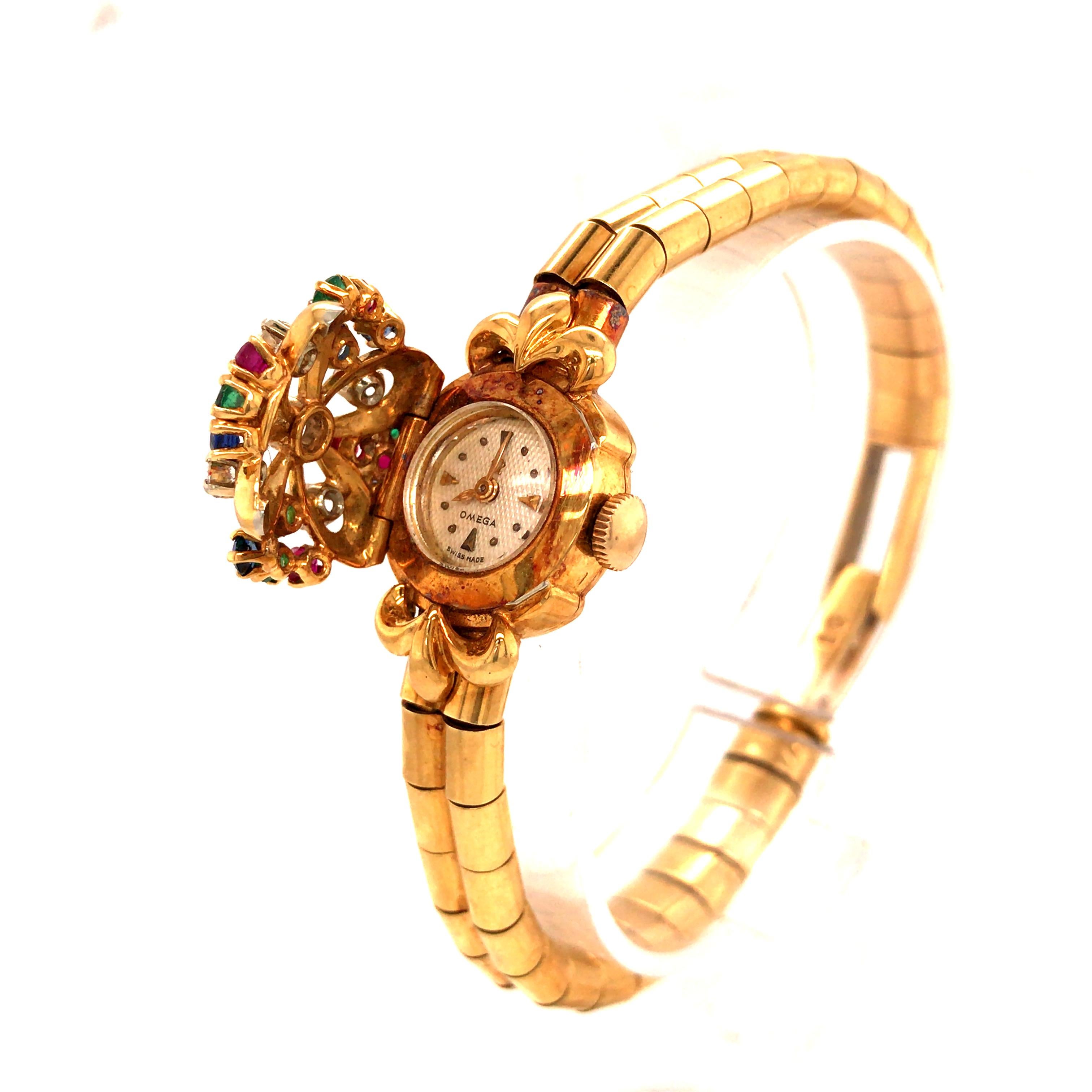 18 Karat Omega Vintage Ladies Diamond and Gemstone Covered Watch Yellow Gold 3