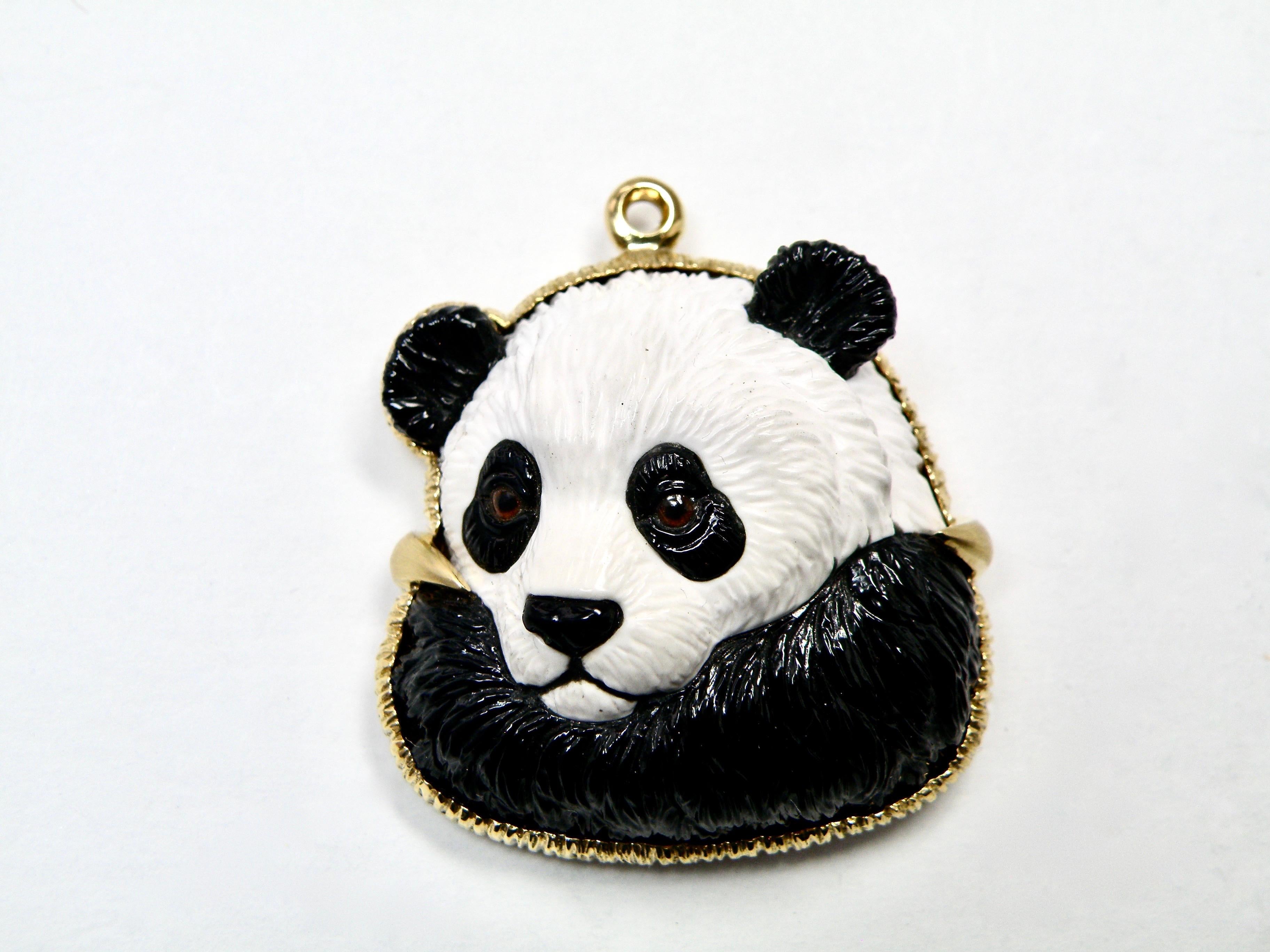 18karat hand carved onyx and cocolong panda pendant with sapphir bail