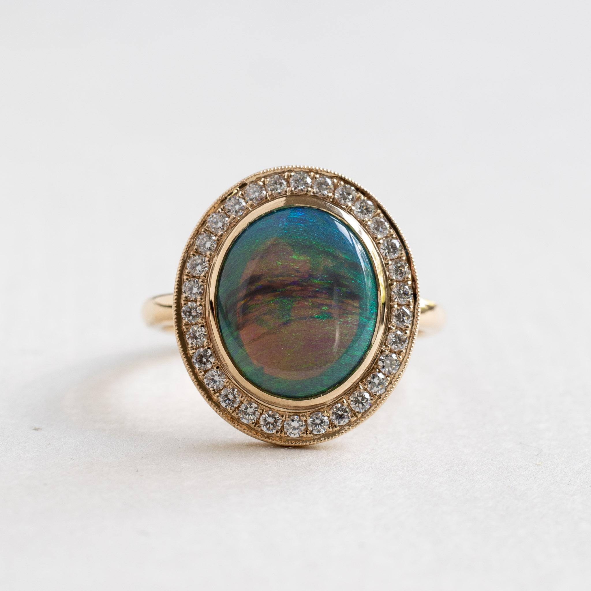 Oval Cut 18K Opal Diamond Halo Ring For Sale