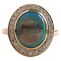 18 Karat Opal Diamant Halo-Ring