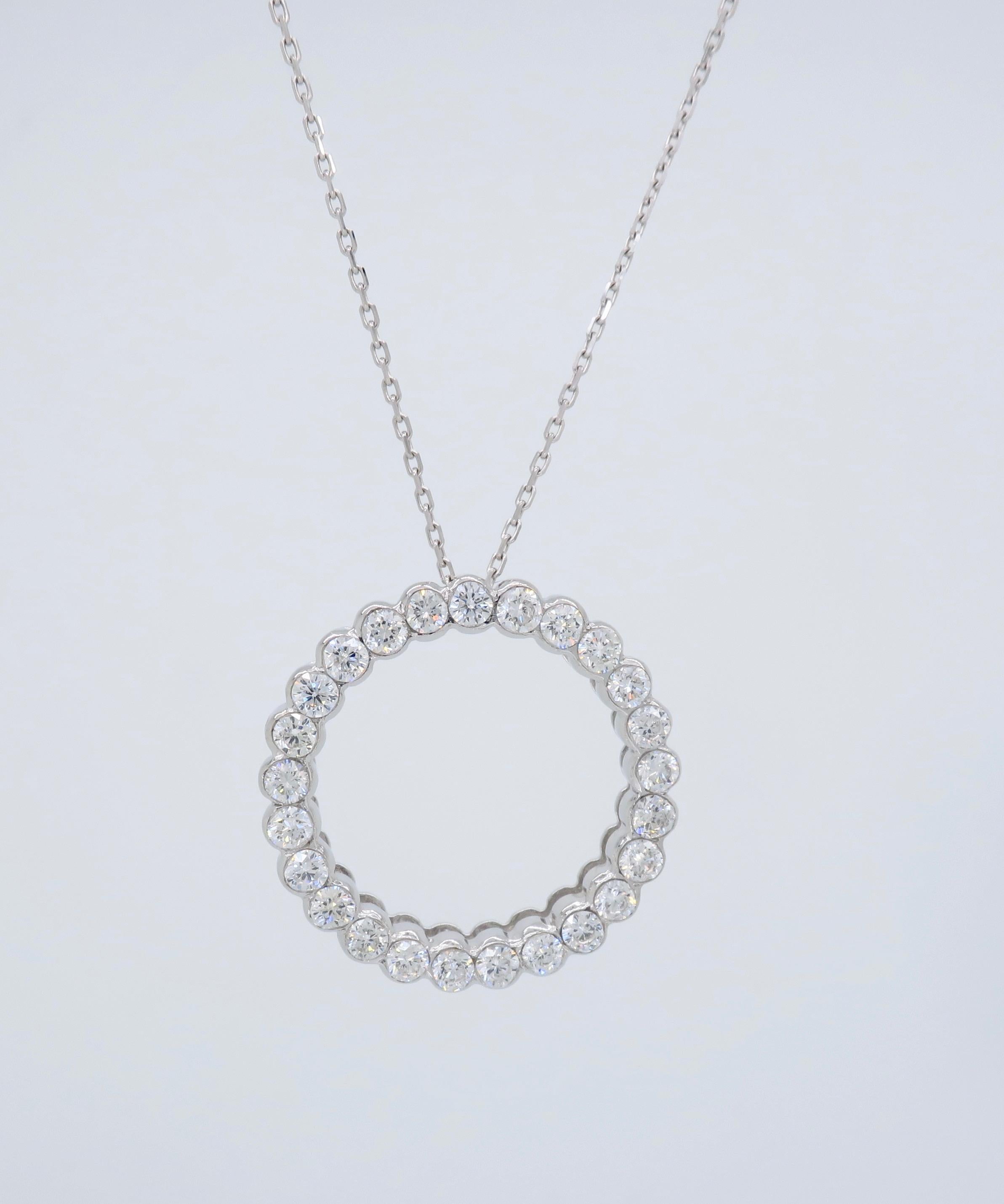 18K white gold circular diamond necklace featuring approximately .80ctw of Round Brilliant cut diamonds.

Total Diamond Carat Weight:  Approximately .80CTW
Diamond Cut: Round Brilliant 
Color: Average G-H
Clarity: Average VS
Metal: 18K White