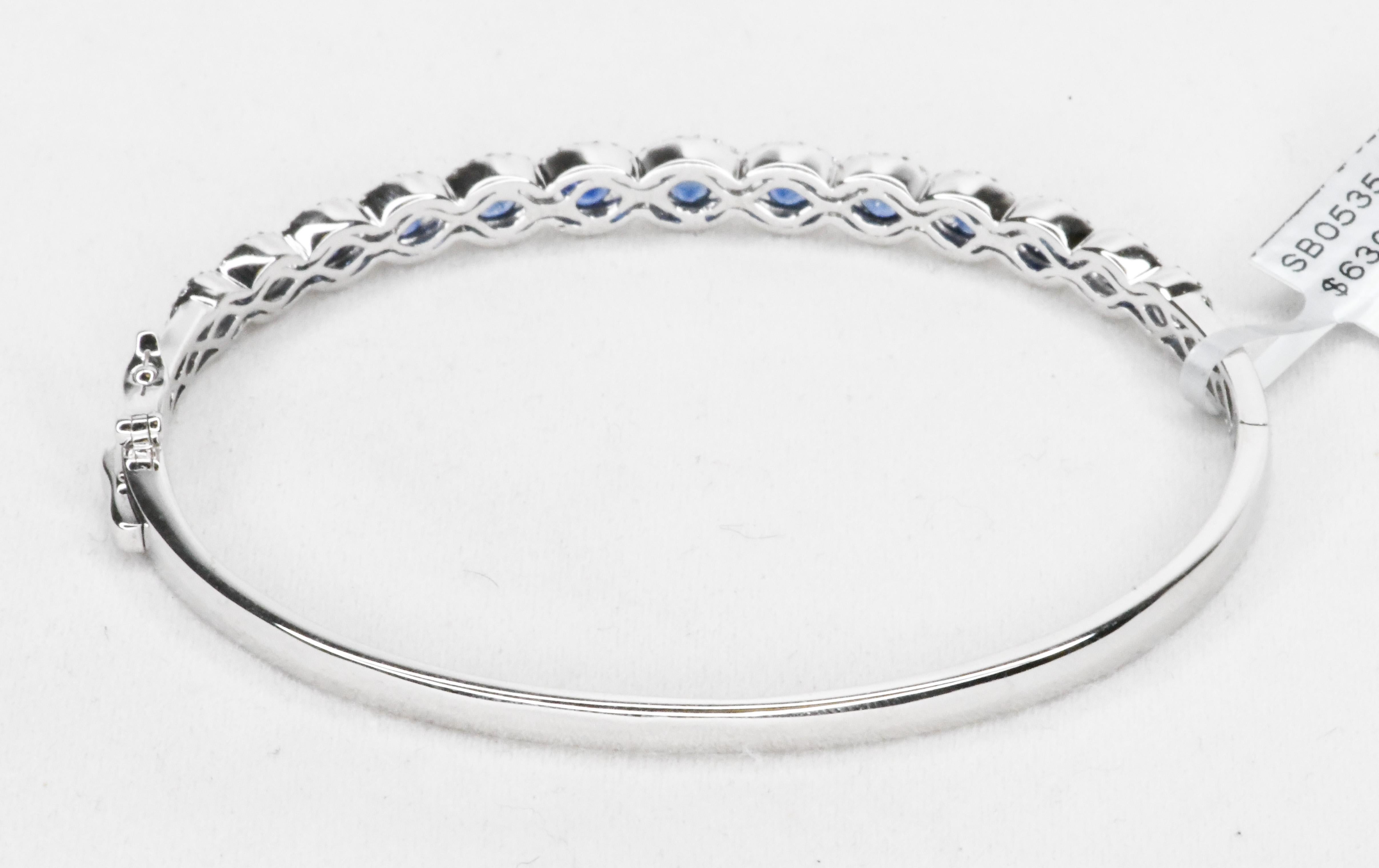 Oval Cut 18 Karat Oval Blue Sapphires and Diamonds Bangle Bracelet
