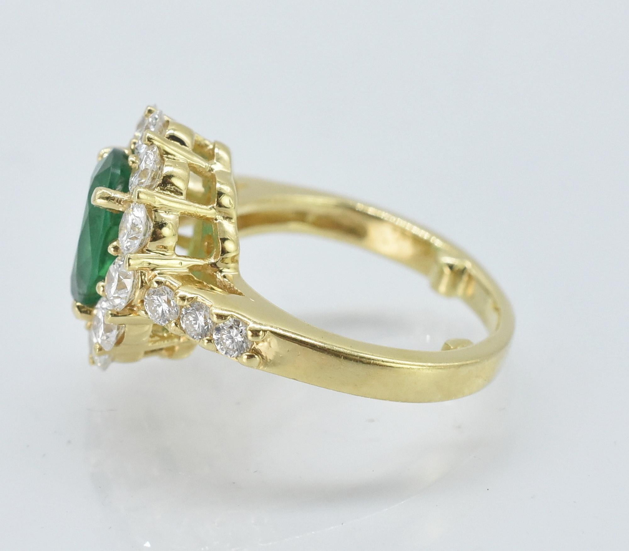 20th Century 18k Oval Emerald and Diamond Ring For Sale