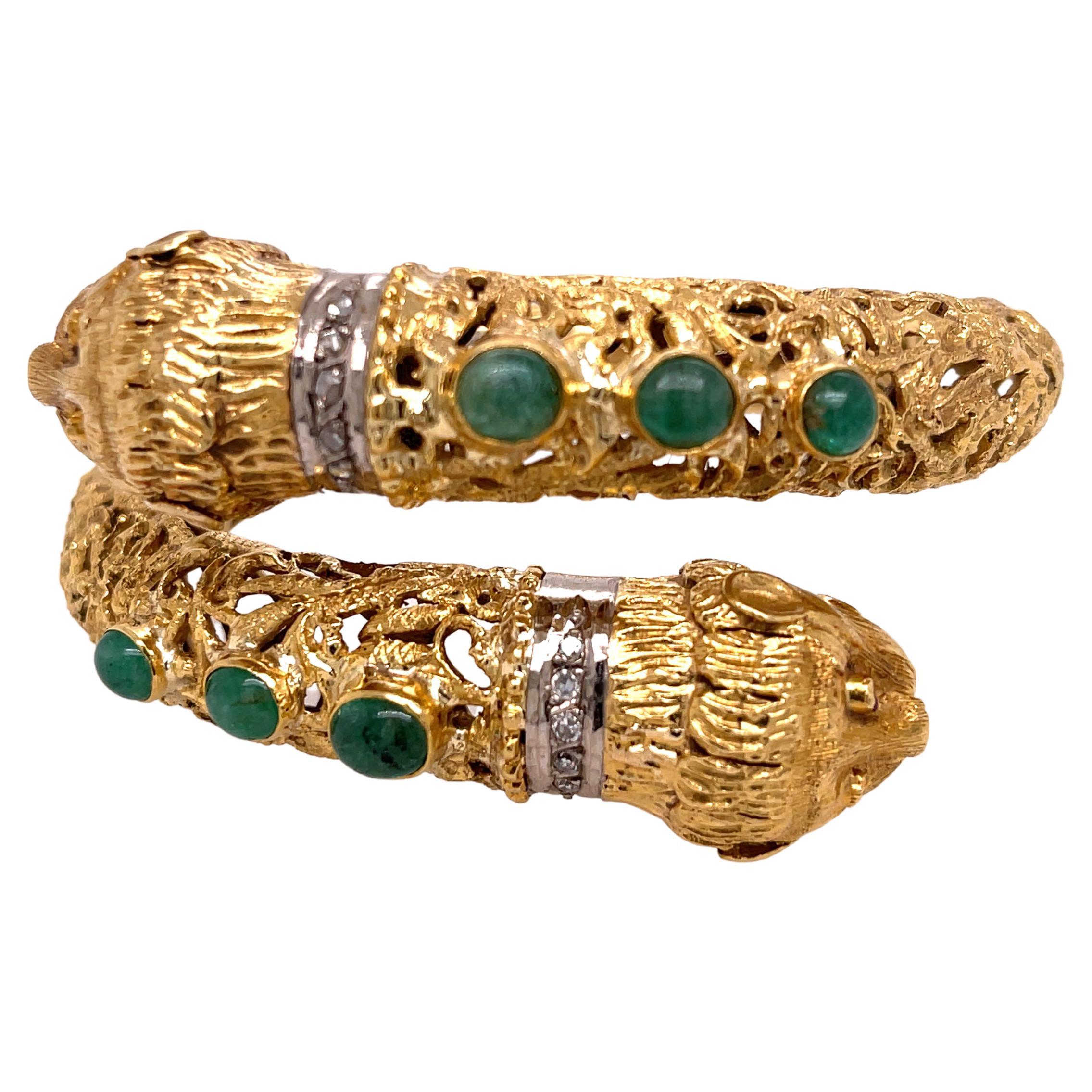 This stunning bracelet features 6 oval cut cabochon jade, diamonds and Bezel set rubies for eyes. The bracelet makes two lion heads at either end.