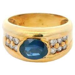 18k Oval Sapphire 12 Diamonds Ring