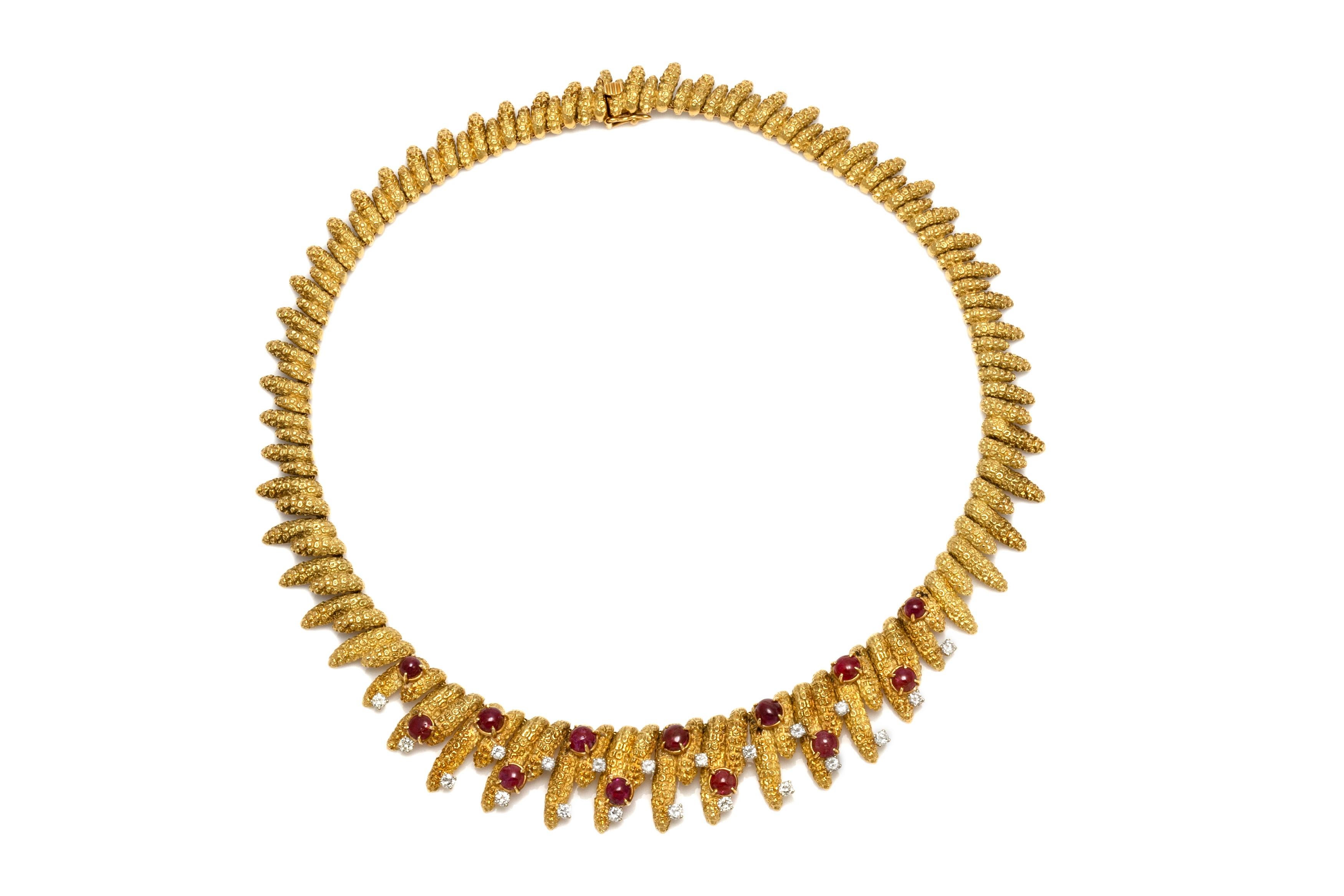 Finley crafted in 18k yellow gold with cabochon Rubies weighing approximately a total of 4.00 carats, and Round Brilliant cut Diamonds weighing approximately 1.50 carats.
French, made in Paris
Circa 1960s
