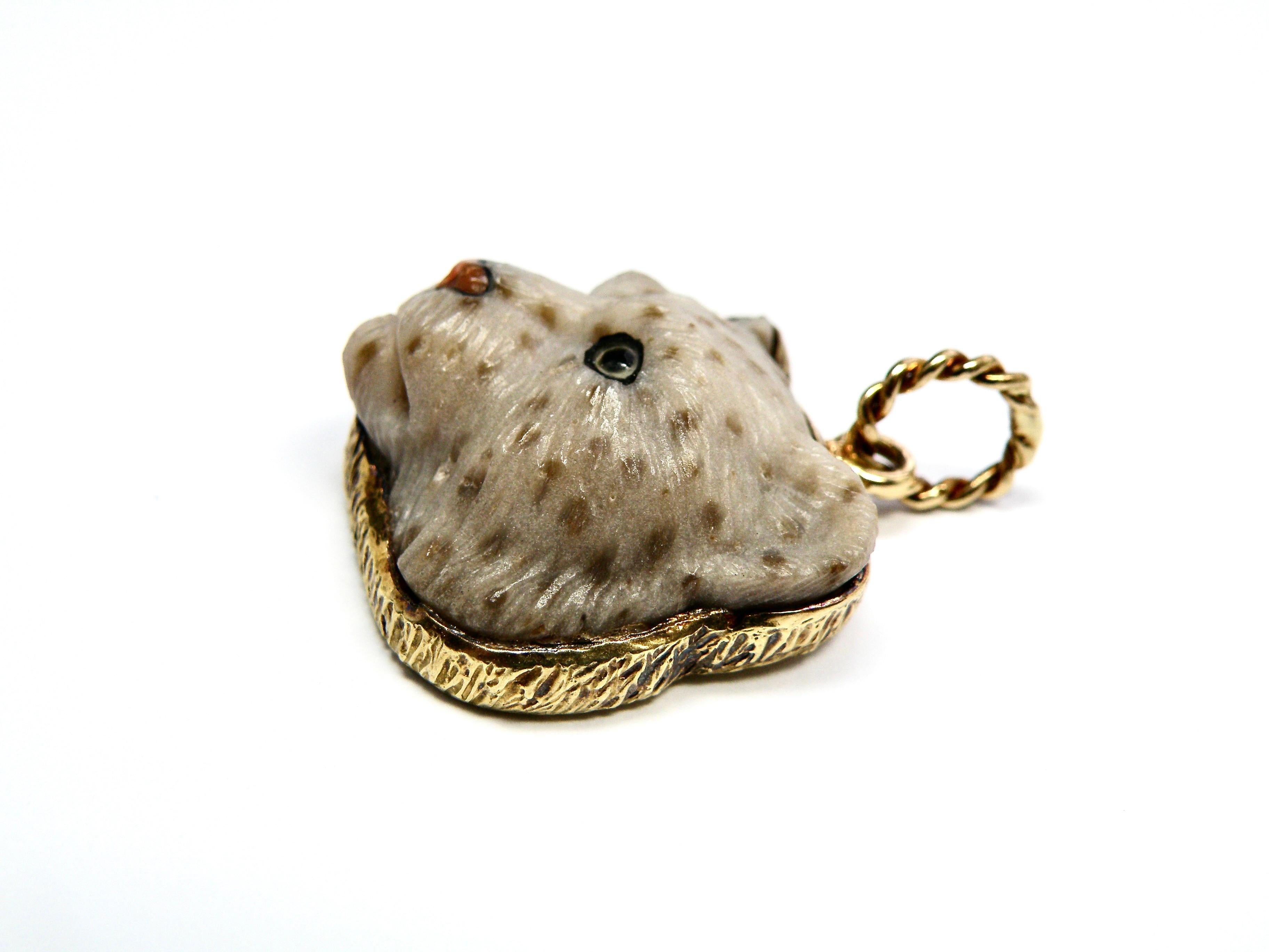 Hand carved Petrified Palm Panther Head. The nose is coral. All necklaces represented here are for photography layout only.