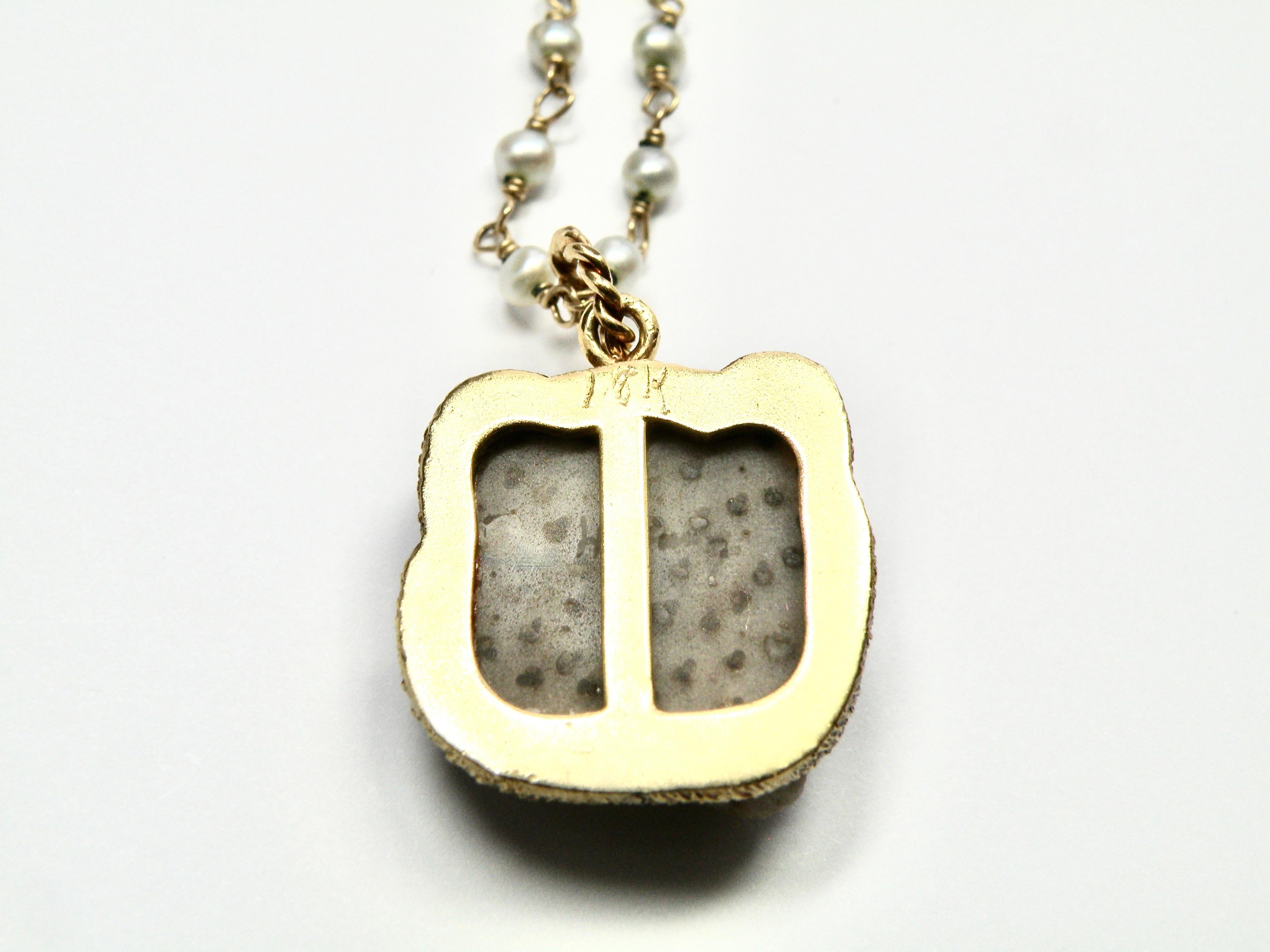 Contemporary 18k pendant hand carved petrified palm Panther head For Sale