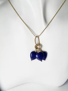 Colgante de 18 quilates con tres corazones de lapislázuli