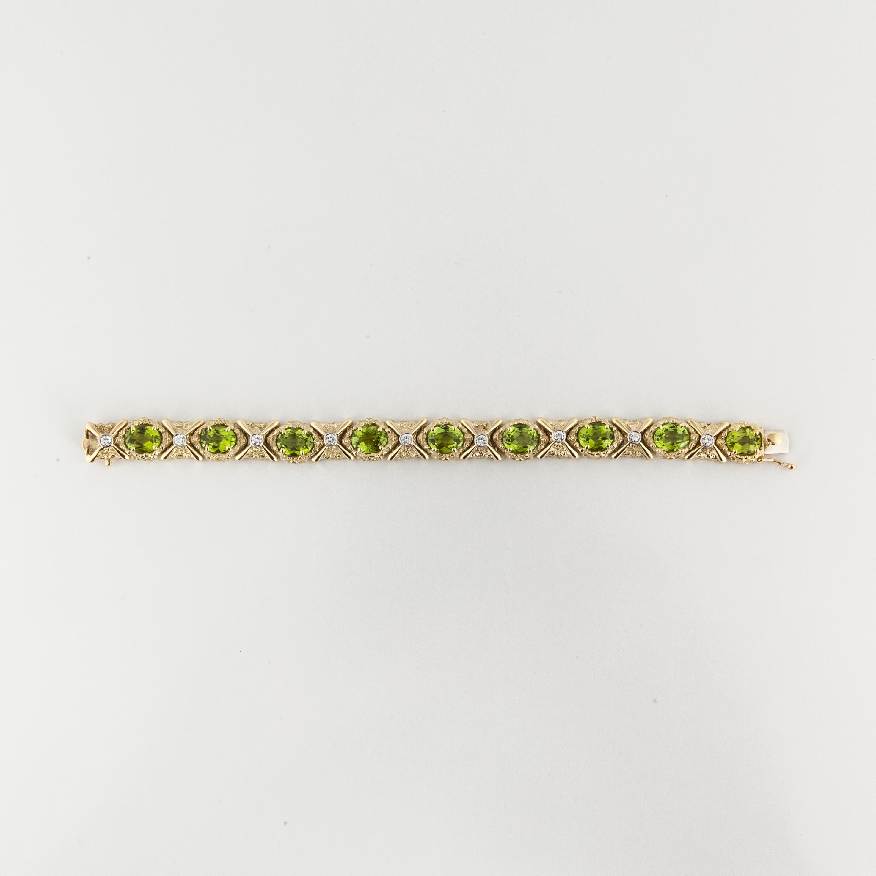 Bracelet in 18K yellow gold with peridots and diamonds.  There are nine (9) oval peridots totaling 18 carats.  In addition, there are nine (9) round diamonds that total 1.25 carats; G-H color and VS clarity.  The bracelet measures 7 inches long and