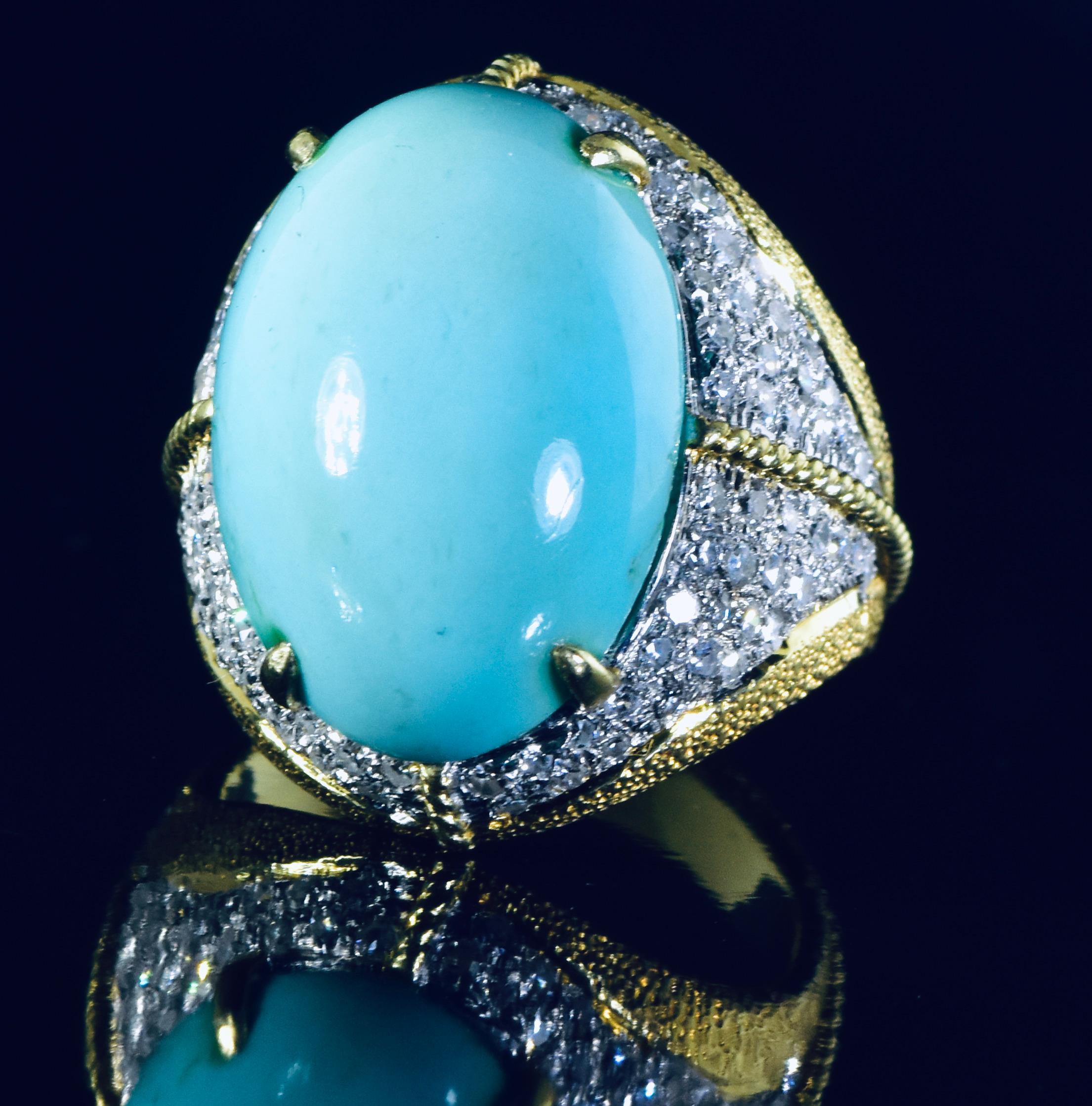18K, diamond and fine old natural Persian Turquoise ring.  This large and impressive ring in 18K yellow gold with a stippled patina with rope gold accents, centers a fine oval stone with the classic turquoise color from the mines of Persia, weighing