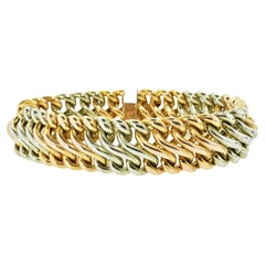 Bracelet souple contemporain large et lourd en or rose et blanc 18 carats.