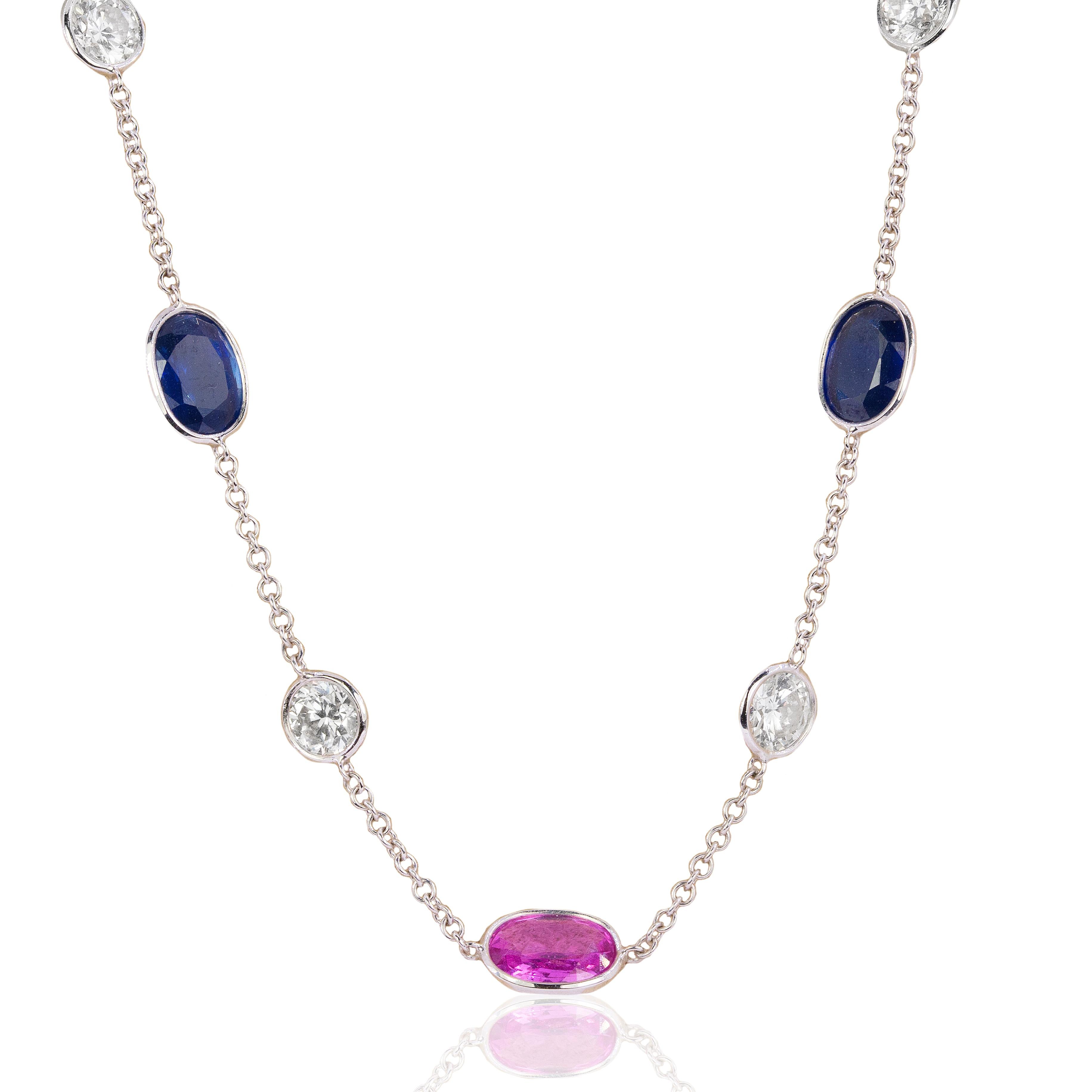 18k Neckalce with 3 pink sapphires weighing 4.01 carats and 5 blue sapphires weighing 6.28 carats and 12 diamonds weighing 5.08 carats