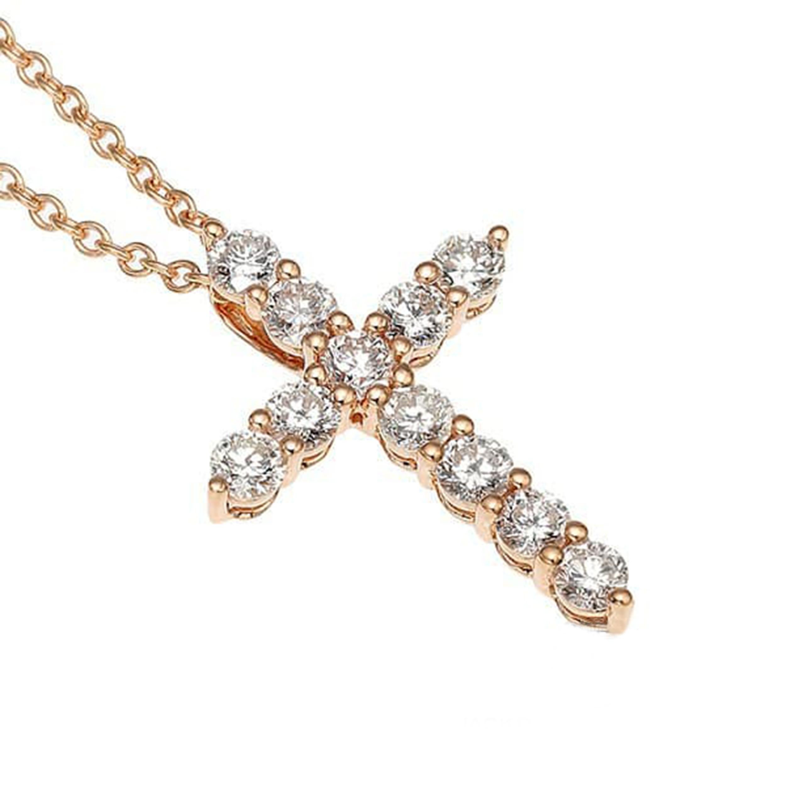 Erhöhen Sie Ihren Stil mit dieser atemberaubenden Kreuz-Halskette mit Diamanten aus 18 Karat Roségold. Dieses mit Präzision und Eleganz gefertigte Stück mit einem Gesamtgewicht von 0,56 Karat verleiht jedem Ensemble Glanz und