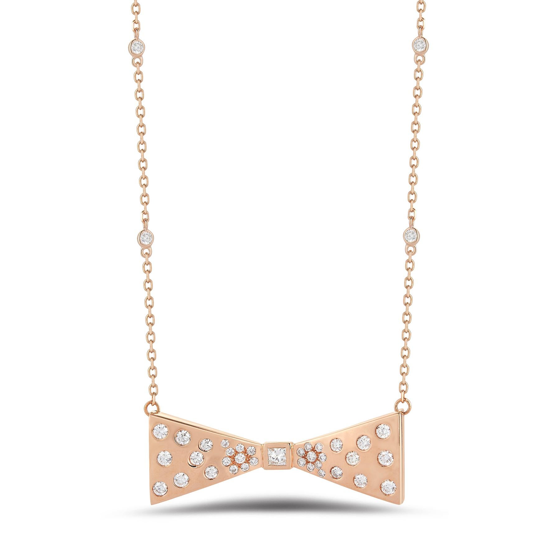 Beautiful 18K Pink Gold Necklace, its chain dotted with Diamonds and displaying a charming Diamond-embellished Bow with a Flawless Princess-cut center stone. 