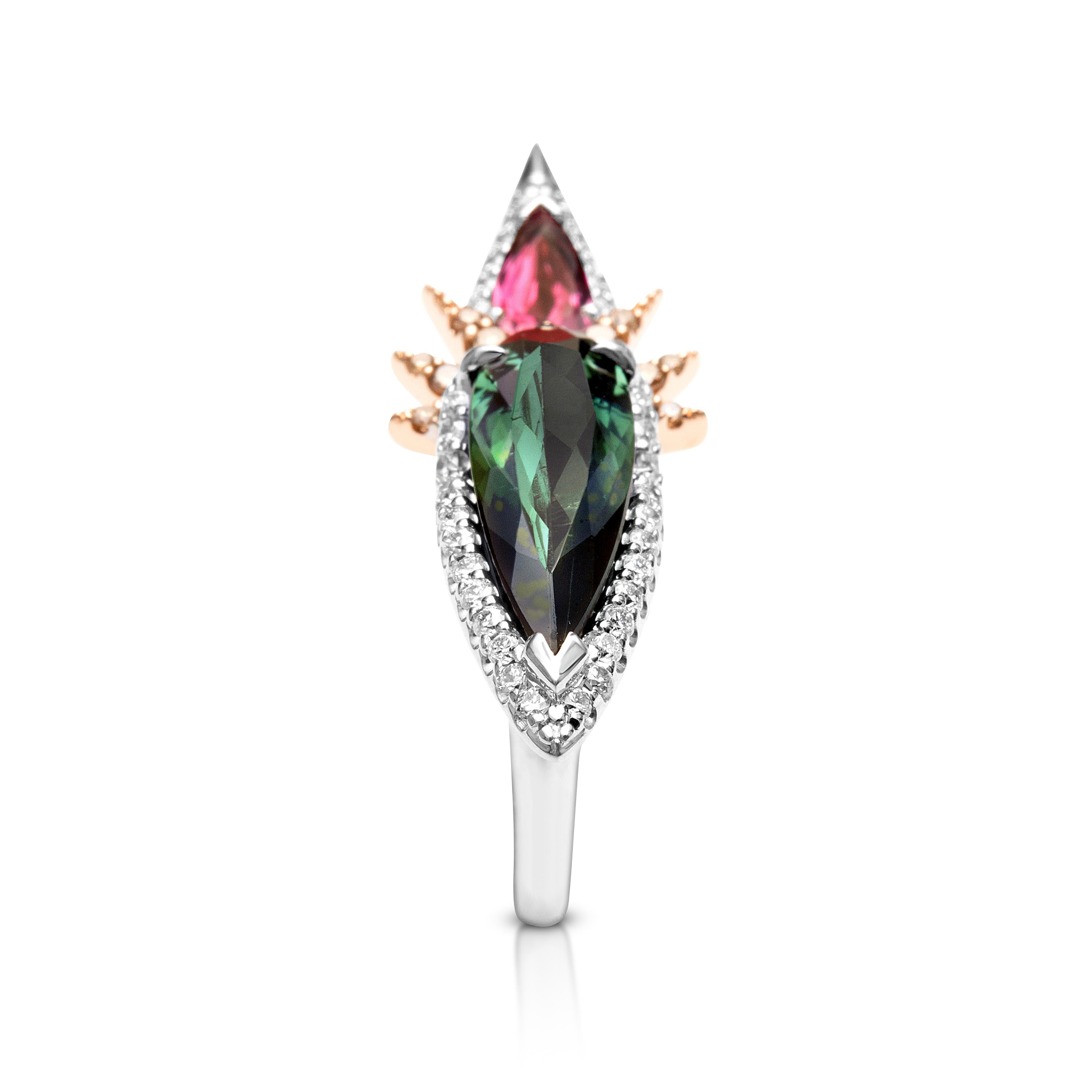 18K White/Rose Gold, Pink/Green Tourmaline Diamond and Cognac Diamond Ring With Filigree Pattern Work, And Heart Detail

-18ct White - Rose Gold  8.3gms
-55 x Round Brilliant Cut Diamonds - Cognac Diamonds F-VS = 0.45ct
-1 x Pear Shaped Pink