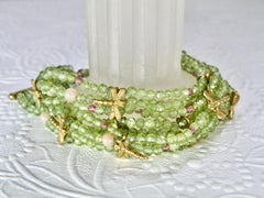 18k plated peridot and dragonfly multi strand bracelet