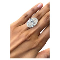 Issac Nussbaum Anillo de platino de 18 quilates con diamante ovalado de color H y claridad VS1.