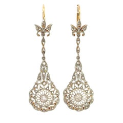 Orecchini pendenti con diamanti Art Deco in platino e 18k