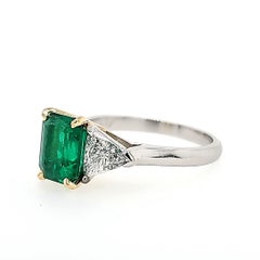 18K/Platinum GIA Certified 1.73 Carat Green Emerald and Trillion Diamond Ring