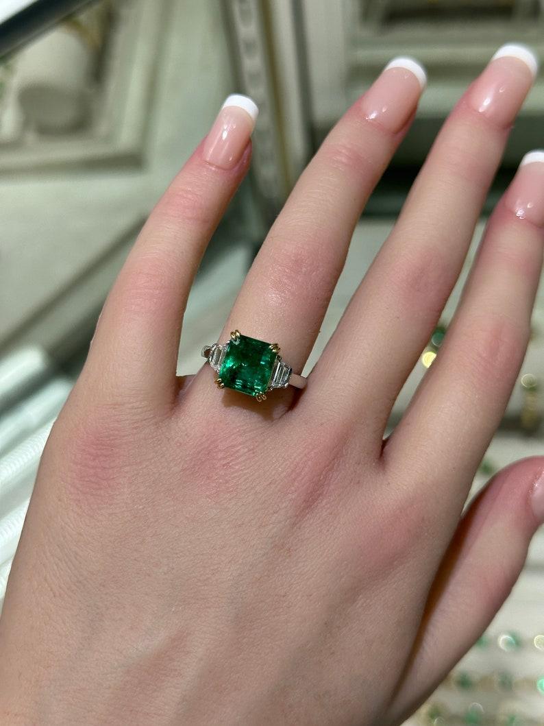 Modern 18K Platinum Three Stone Ring  4.85tcw Asscher Cut Emerald & Trapezoid Diamonds For Sale