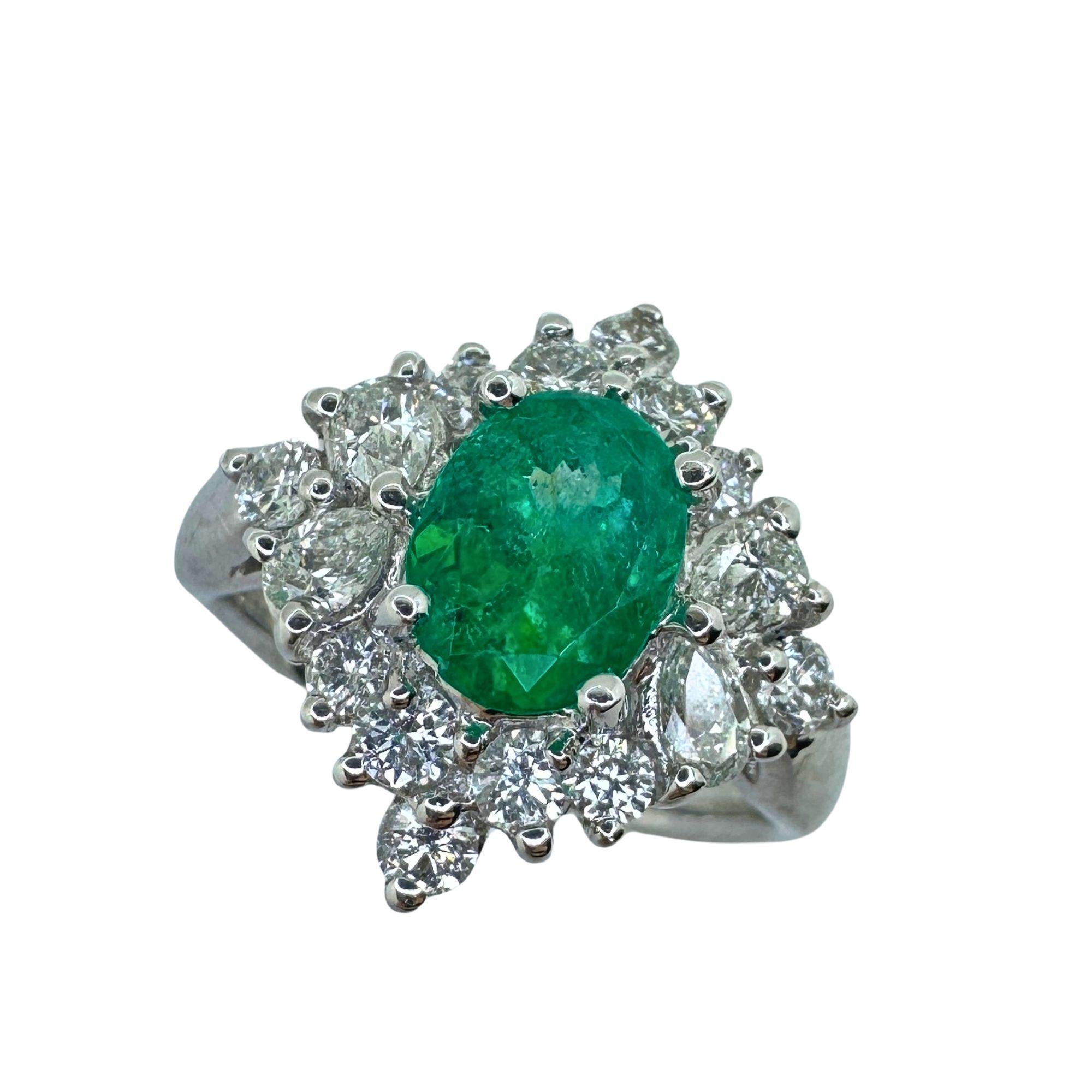 Experience luxury and elegance with our 18k Diamond and Emerald Ring. This exquisite piece features a stunning 0.89 carats of diamonds and a dazzling 1.19 carat emerald center. With a ring size of 6.75 and a weight of 5.61 grams, this ring is a true