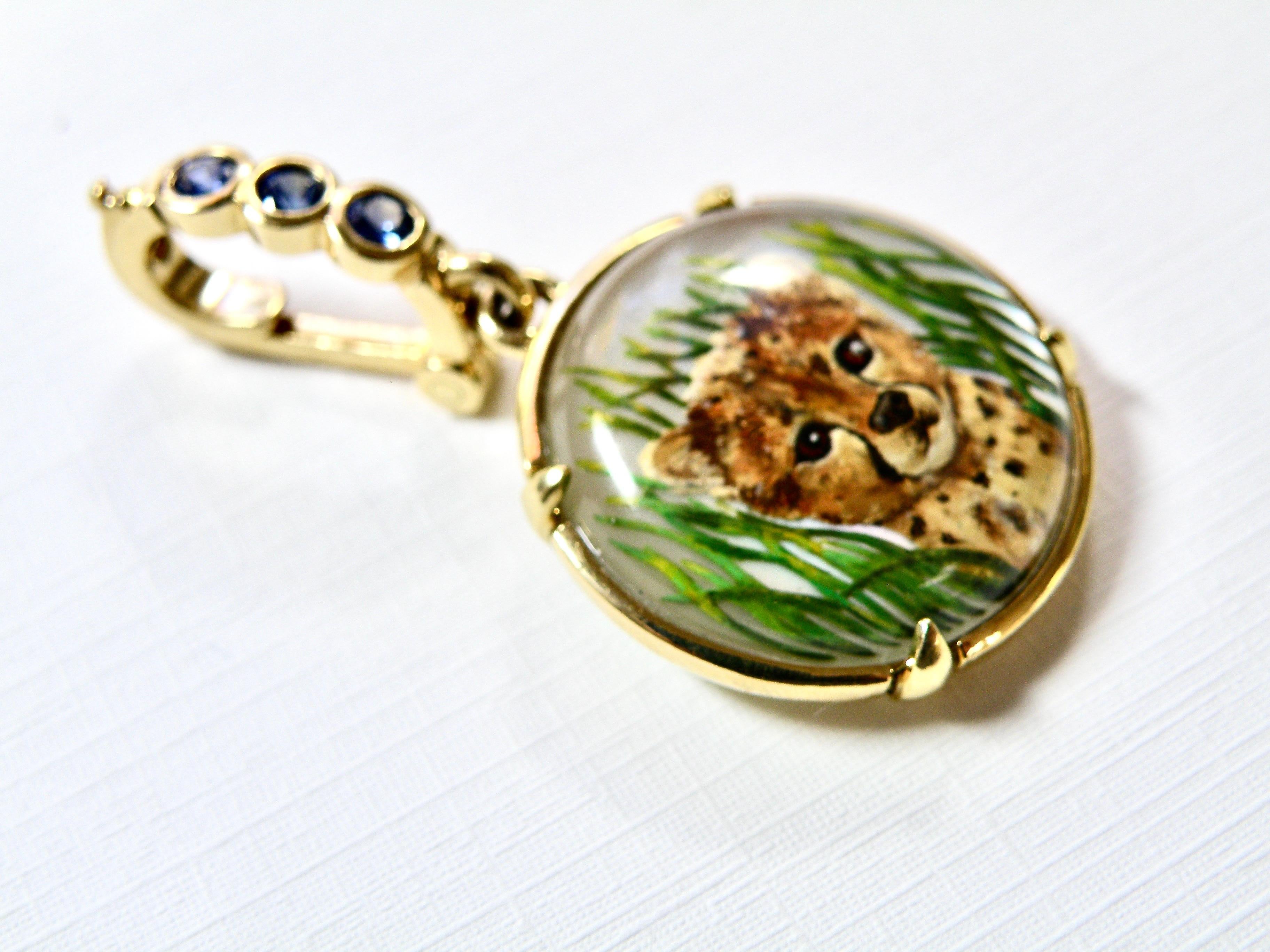 18K lion cub pendant beautifully detailed hand painted reverse quartz crystal backed with mothher of pearl hand painted by Master Carver from Idar Oberstein 14mm round