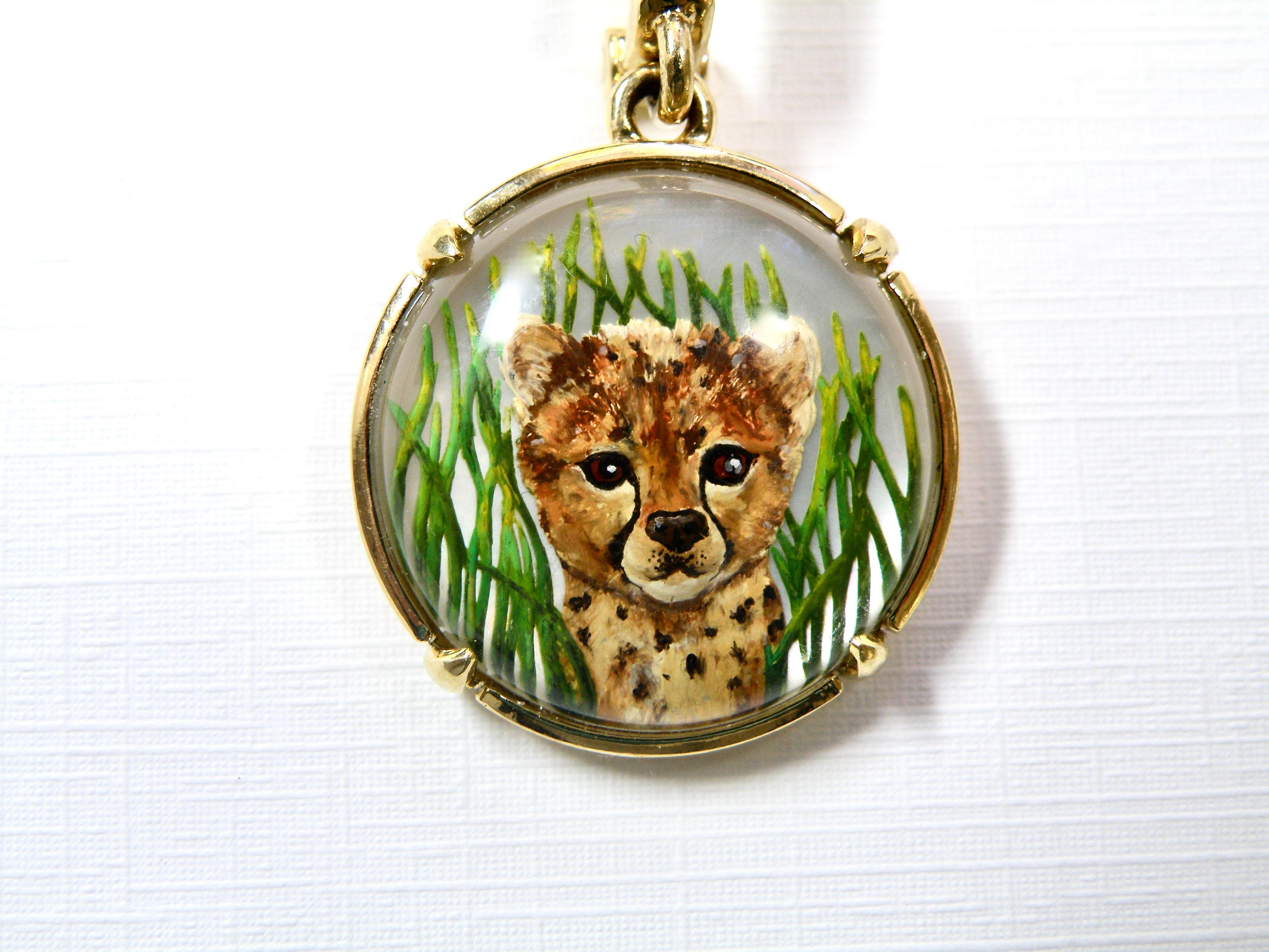 Contemporary 18k Reverse Crystal Lion Cub Pendant For Sale