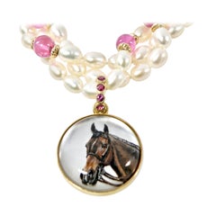 18 Karat Reverse Crystal Painted Horse Pendant with Sapphire Bail