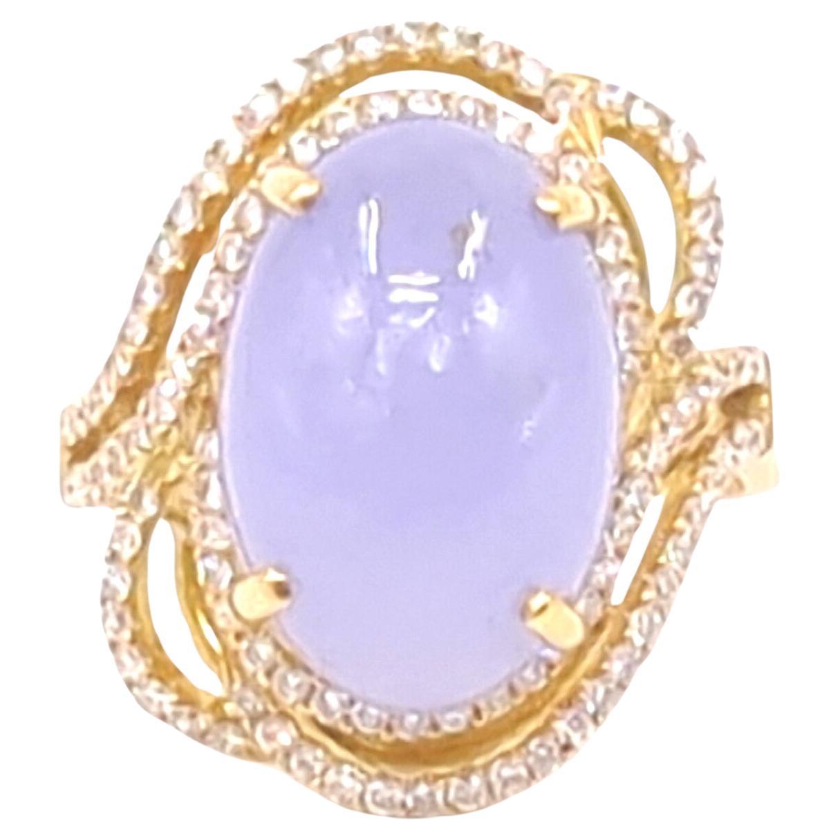 This luxurious ladies' ring, masterfully crafted in 18K rose gold, showcases an oval cabochon of lavender jadeite that is nothing short of exceptional. Certified as A-grade by the NGTC (National Gemstone Testing Center), the jadeite boasts a