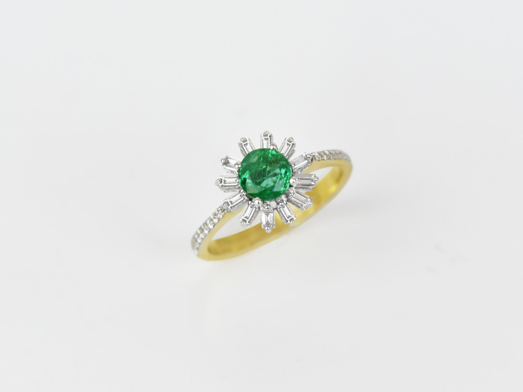 18k Ring 2 Tone Ring White & Yellow Gold Ring Diamond Ring  Emerald  Ring Emerald Rounds Ring  2 Tone Gold Fancy Ring Diamond Baguette Ring 
    An 18K 2 tone, solid white / Yello Gold, round Zambian emerald ring with dazzling diamonds baguette set.