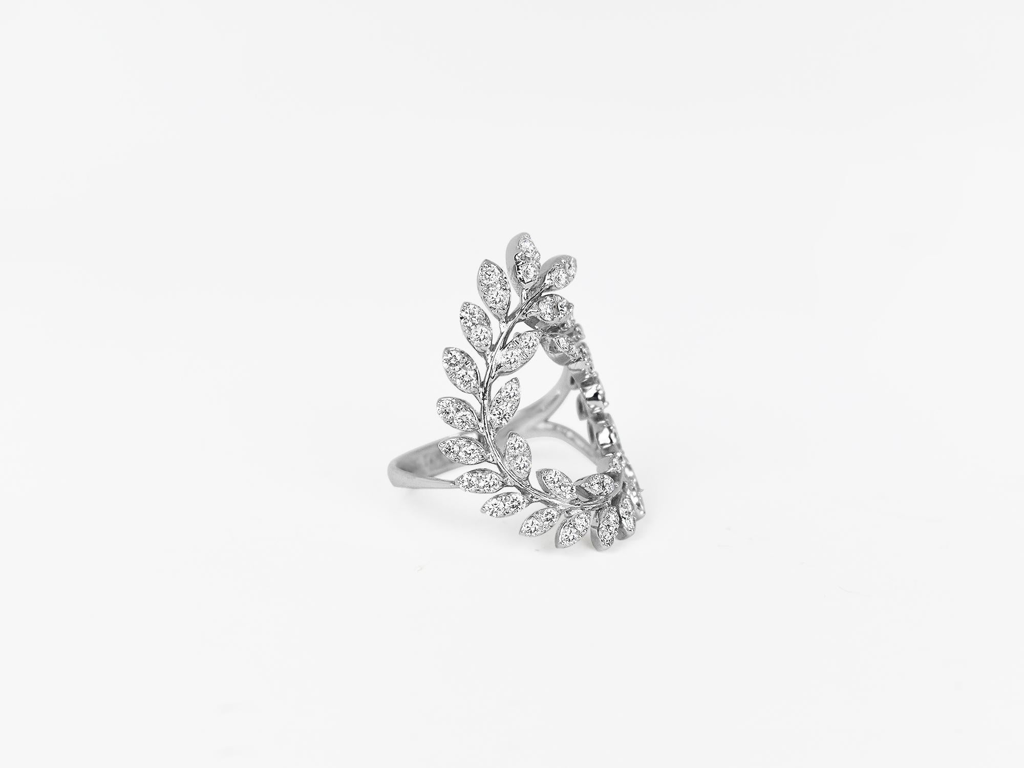 18k Ring White Gold Ring Diamond Ring  Diamond Leaves Ring Gold Fancy Ring
          This 18K solid white gold leaves circle ring is a fancy shape made of brilliant diamonds that have remarkable sophistication, depth, and brilliance.    
           