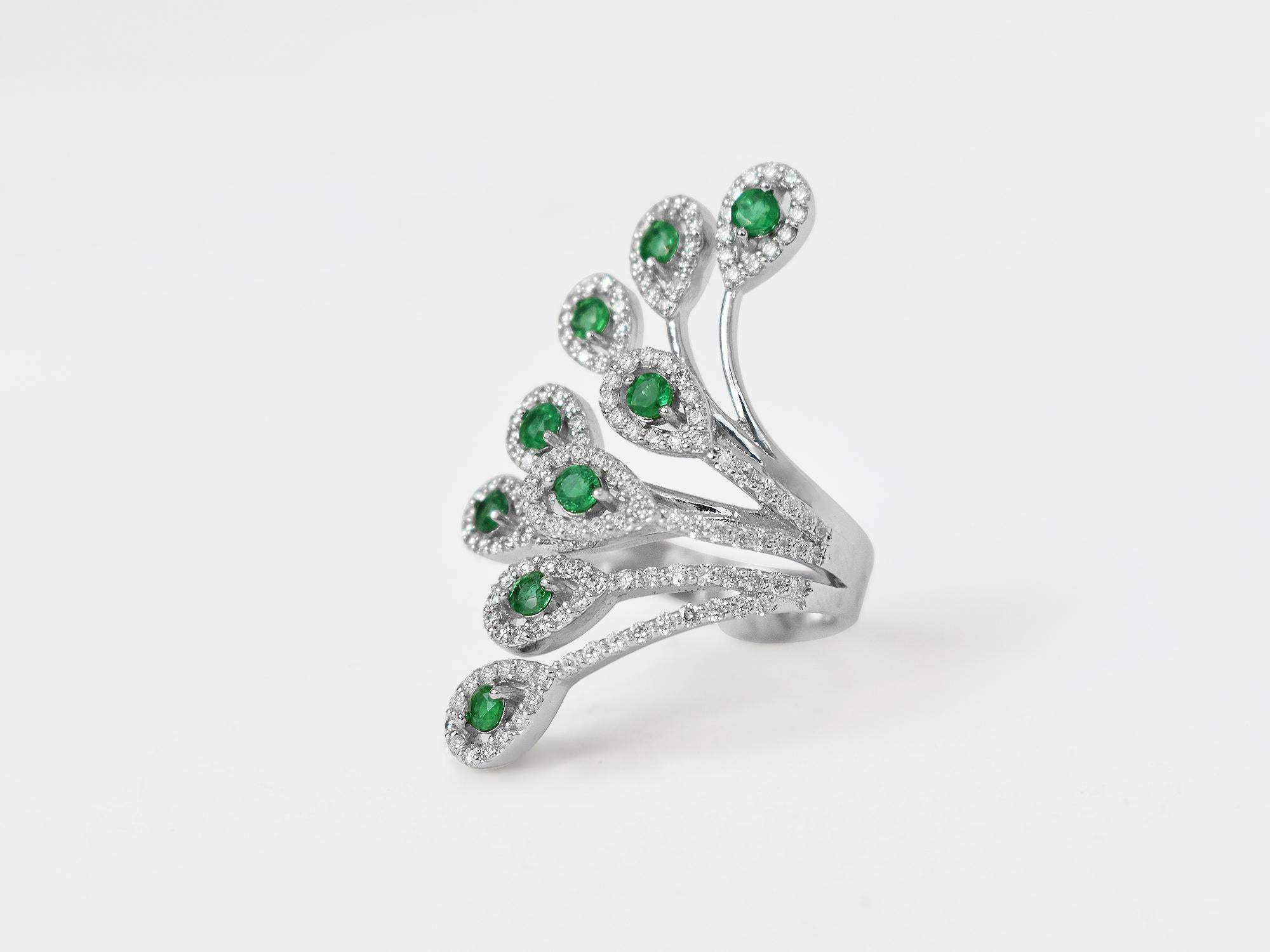 18k Ring White Gold Ring Diamond Ring  Emerald  Ring Emerald Rounds Ring  Gold Fancy Ring
          A fashion Art Nouveau ring meticulously crafted to mesmerize. Each part of this art piece shows the passion for jewelry from Oshi Jewels Designs Inc.