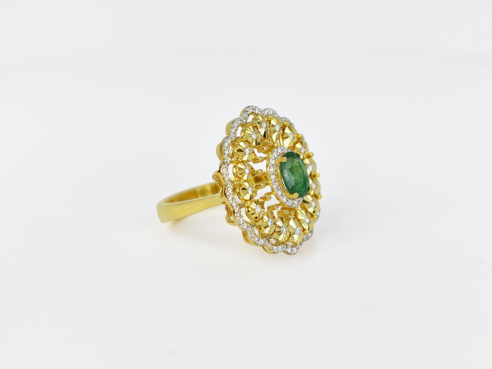 18k Ring Yello Gold Ring Diamond Ring  Emerald  Ring Emerald Oval Ring  Gold Fancy Ring
         This 18K solid white Gold Emerald / Diamond estate ring. The fine Quality gold finishing with oval shape Zambian emeralds & scintillating cluster pave