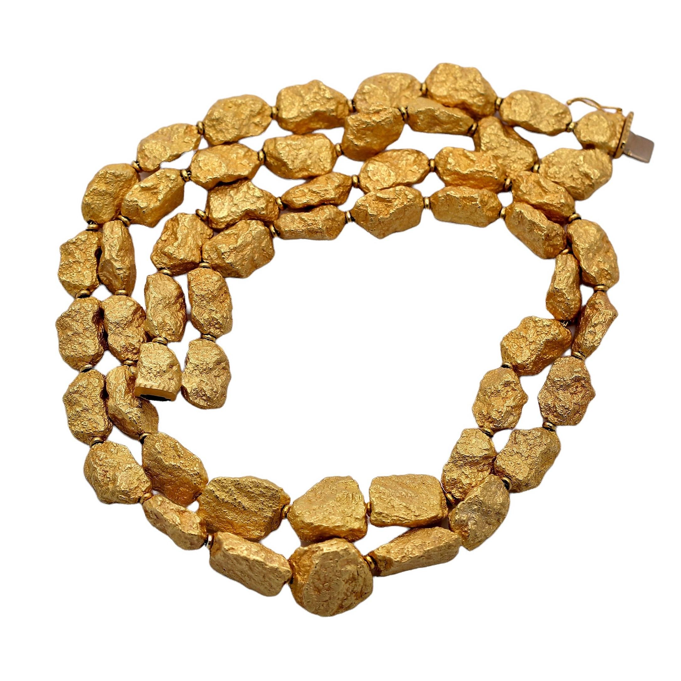 This rare and wonderful Roberto Coin designed 18K yellow gold double line, chunky nugget necklace captures the exact feeling of real pure gold, just as it is mined from the Earth. Every nugget is lifelike and a 24K wash, applied in the maker's shop,