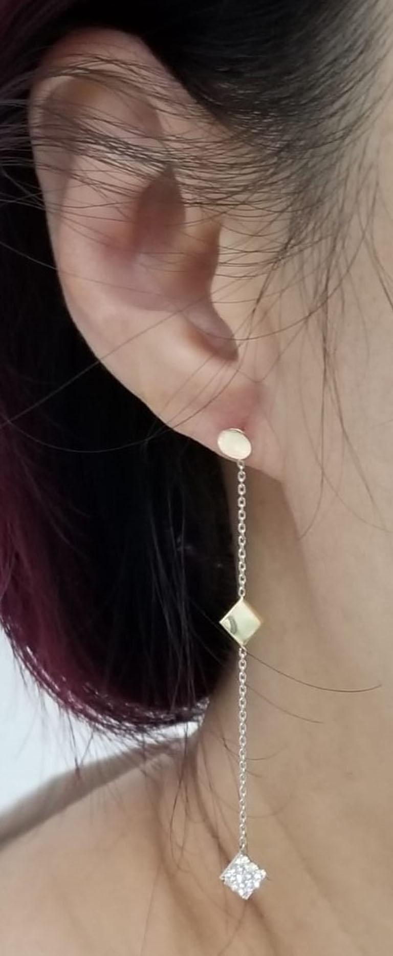 Art déco Boucle d'oreille pendante en or rose et blanc avec diamant de 0,53 carat en vente