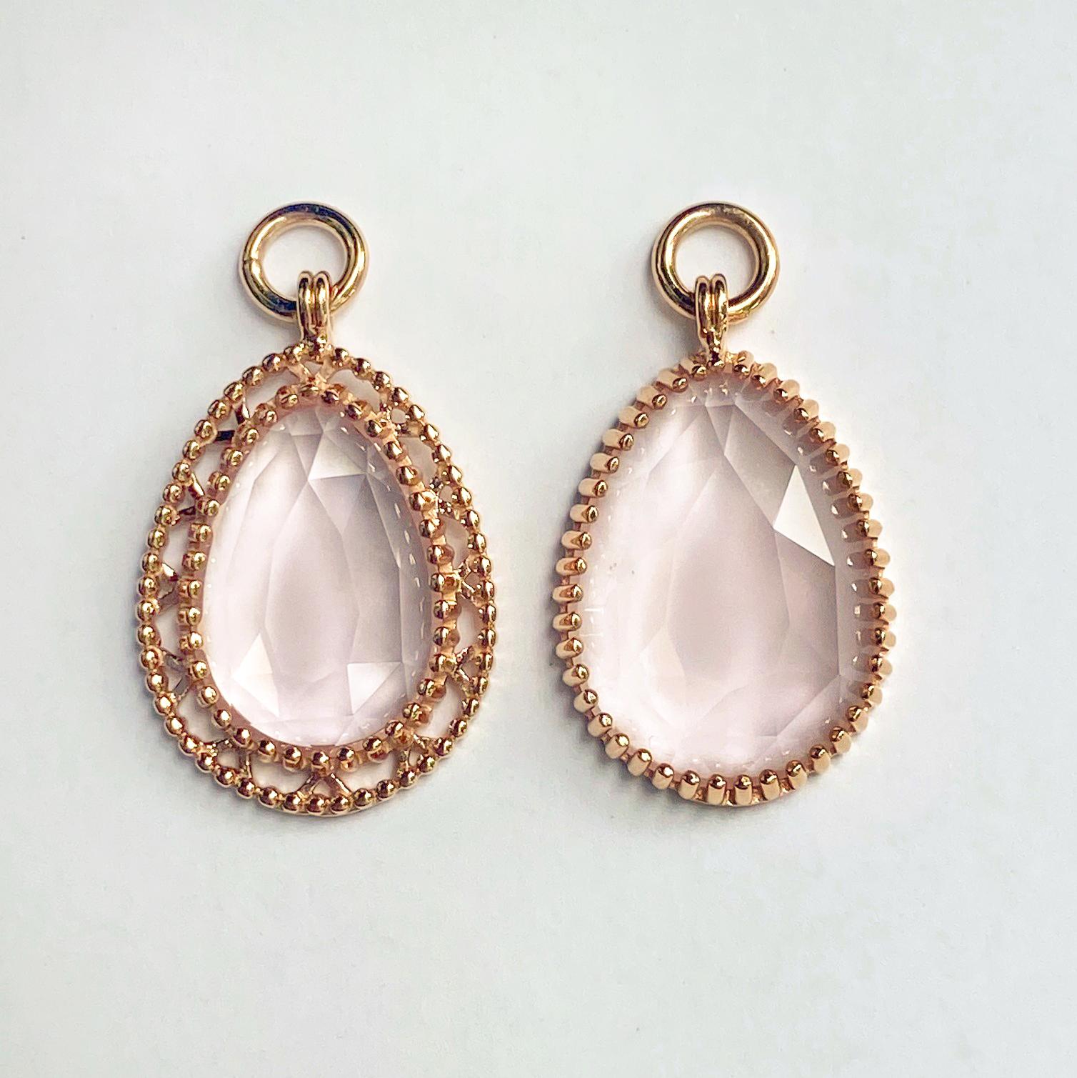 A pair of reversible 18k rose and white gold scroll style huggie hoops, with a pair of asymmetrical 18k rose gold jackets set with 9.86 carat lens cut rose quartz. These earrings were made and designed by llyn strong.
Items can be sold separately