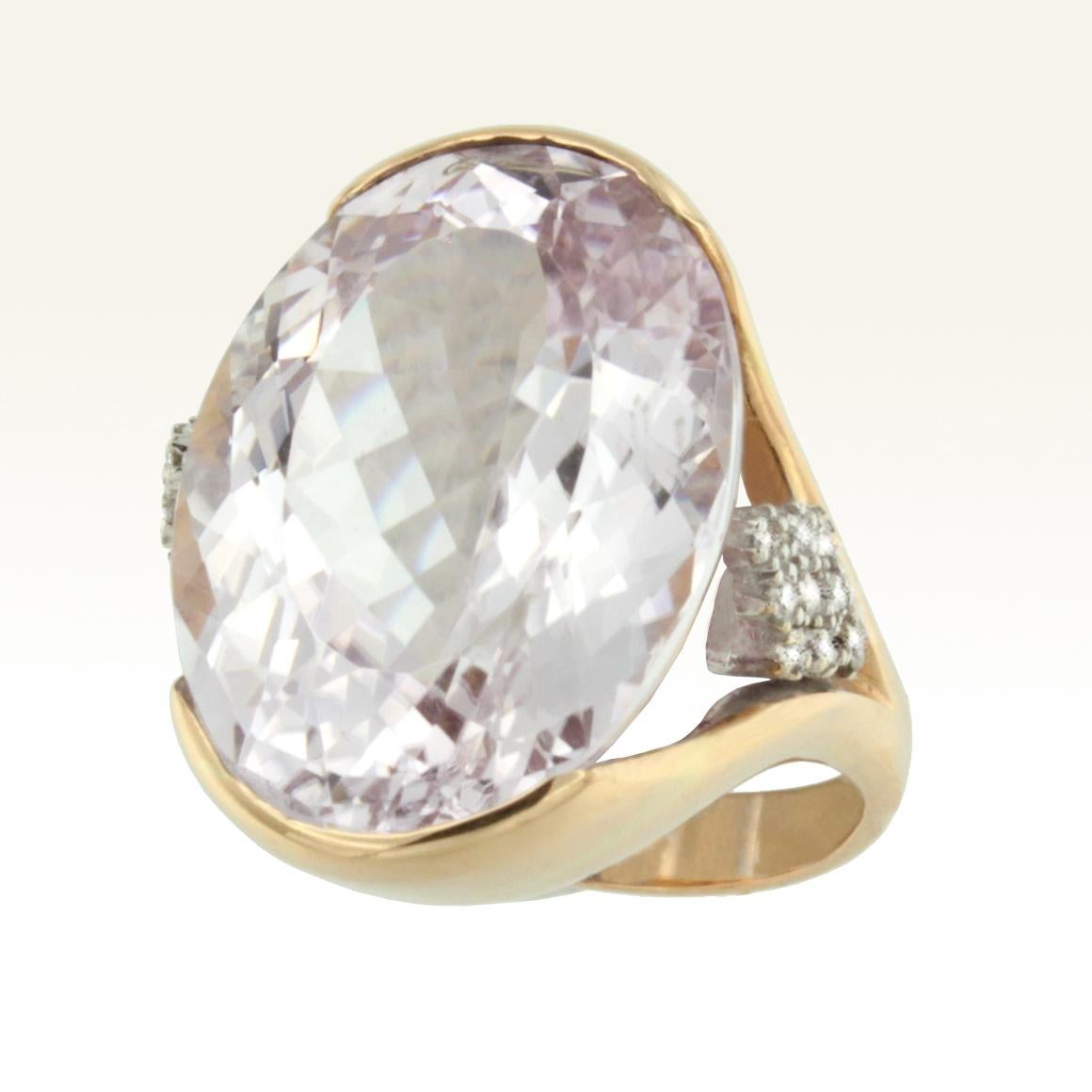 Ring in 18k white and rose gold with Kunzite (oval cut, size: 16x22 mm; carats 25,75 ) and Diamonds karat 0.20 VS colour G/H   g.14.80
Kunzite is the perfect stone for those who sometimes can't resist emotions, bright pink color. Amazing cocktail