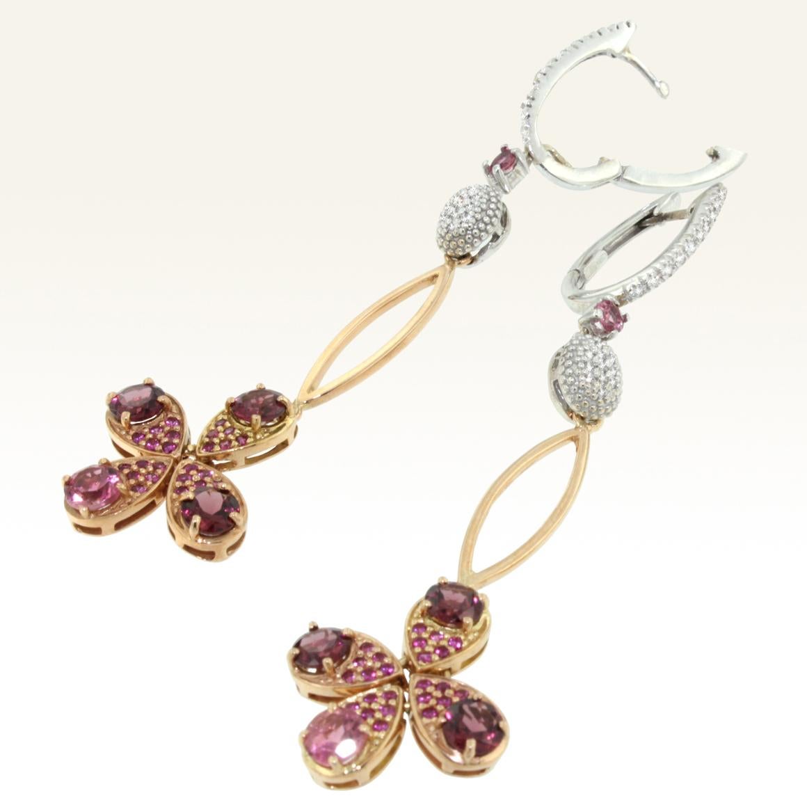 Modern Earrings in 18k rose and white gold with pink Tourmaline (round cut, size: mm and mm) and diamonds ct 0,35VS colour G/H   g.16,00
Elegant earrings ispired by a rare flower. Made in Italy by Stanoppi Jewellery since 1948
(possibility to have