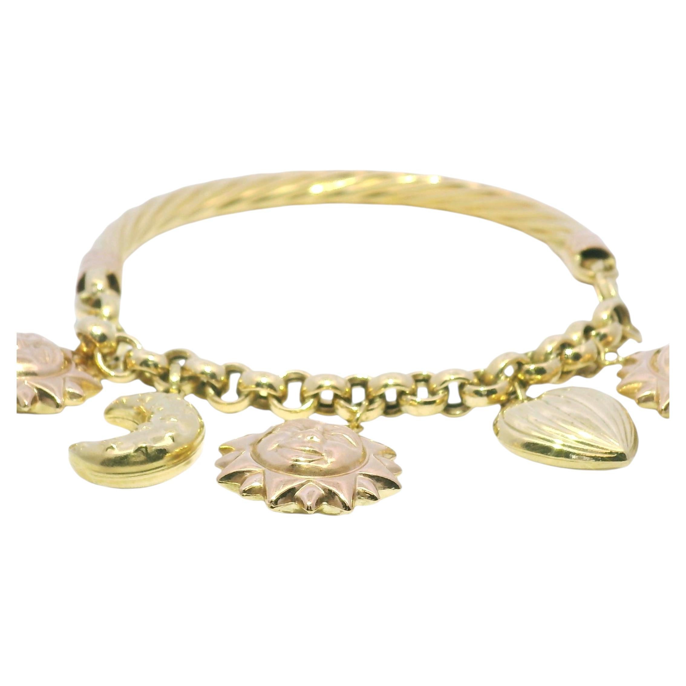 Bracciale con 5 charm in oro giallo e rosa 18k con sole, luna e cuore penzolanti In magazzino