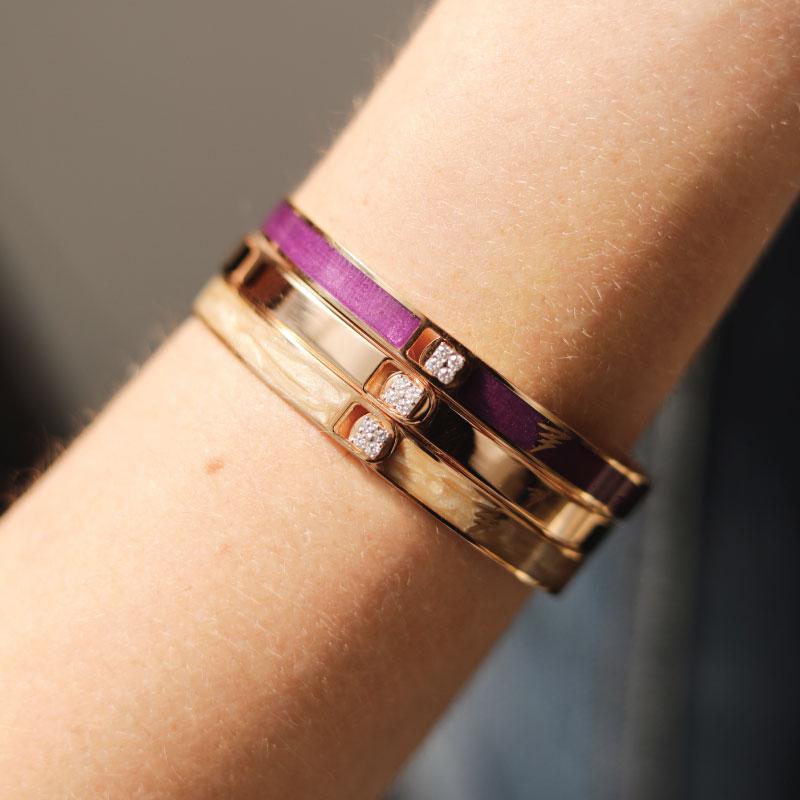 A ray of light, a band of colours, an illusion and journey on a wavelength. Iconic, bold and unique hand painted stackable designs. Add your personal touch to each design with your initials or a symbol.

Product Name: Solid Bracelet
Diamonds:
