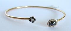 18 Karat Rose Gold 0.47 Carat Black Diamonds 0.16 Carat White Diamonds Bangle