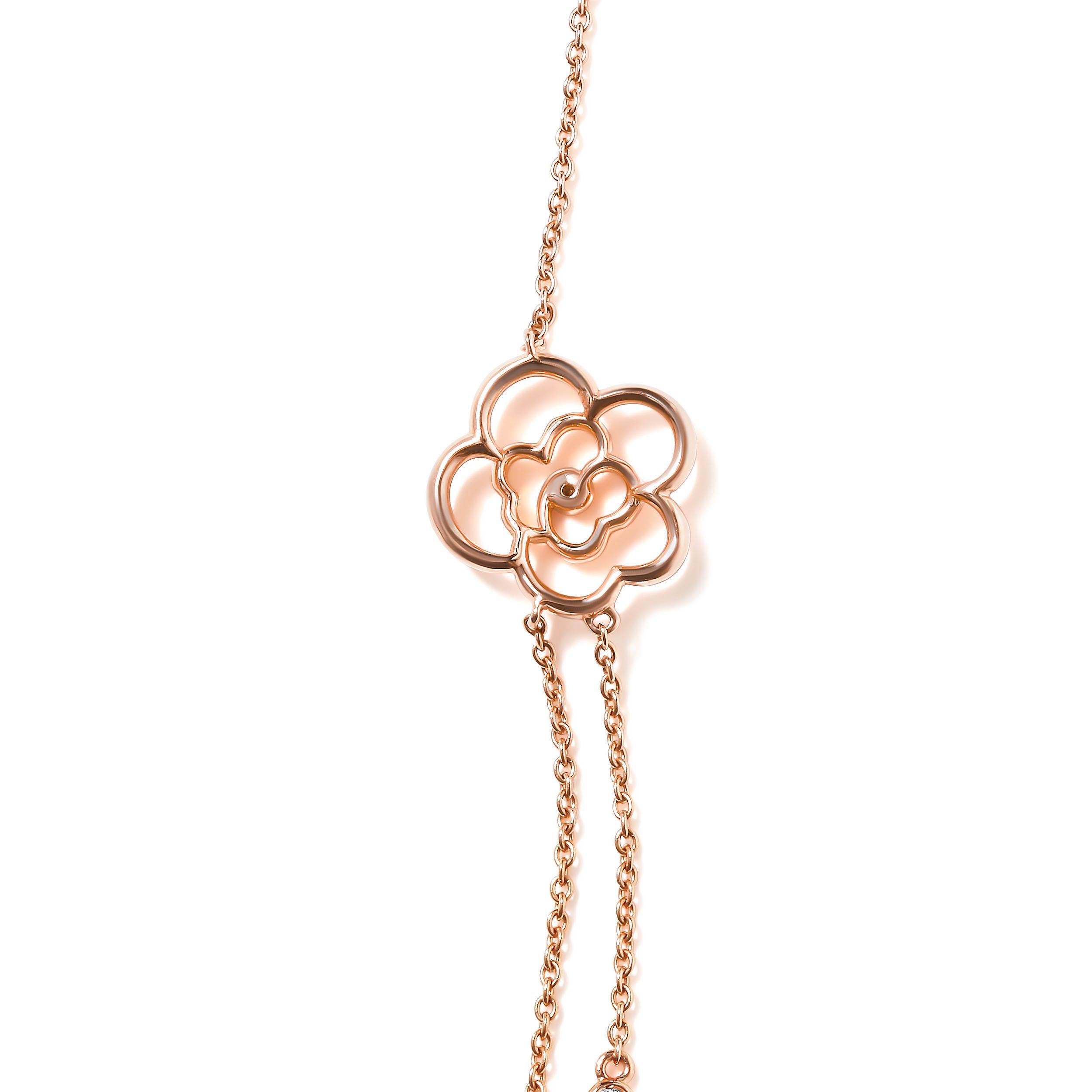 Diamonds and pearls are spaced along a delicate cable chain in this chic 18k rose gold station in a double strand design that can be worn with a variety of different styles. Multi-sized Chinese freshwater cultured round ivory pearls in cup settings