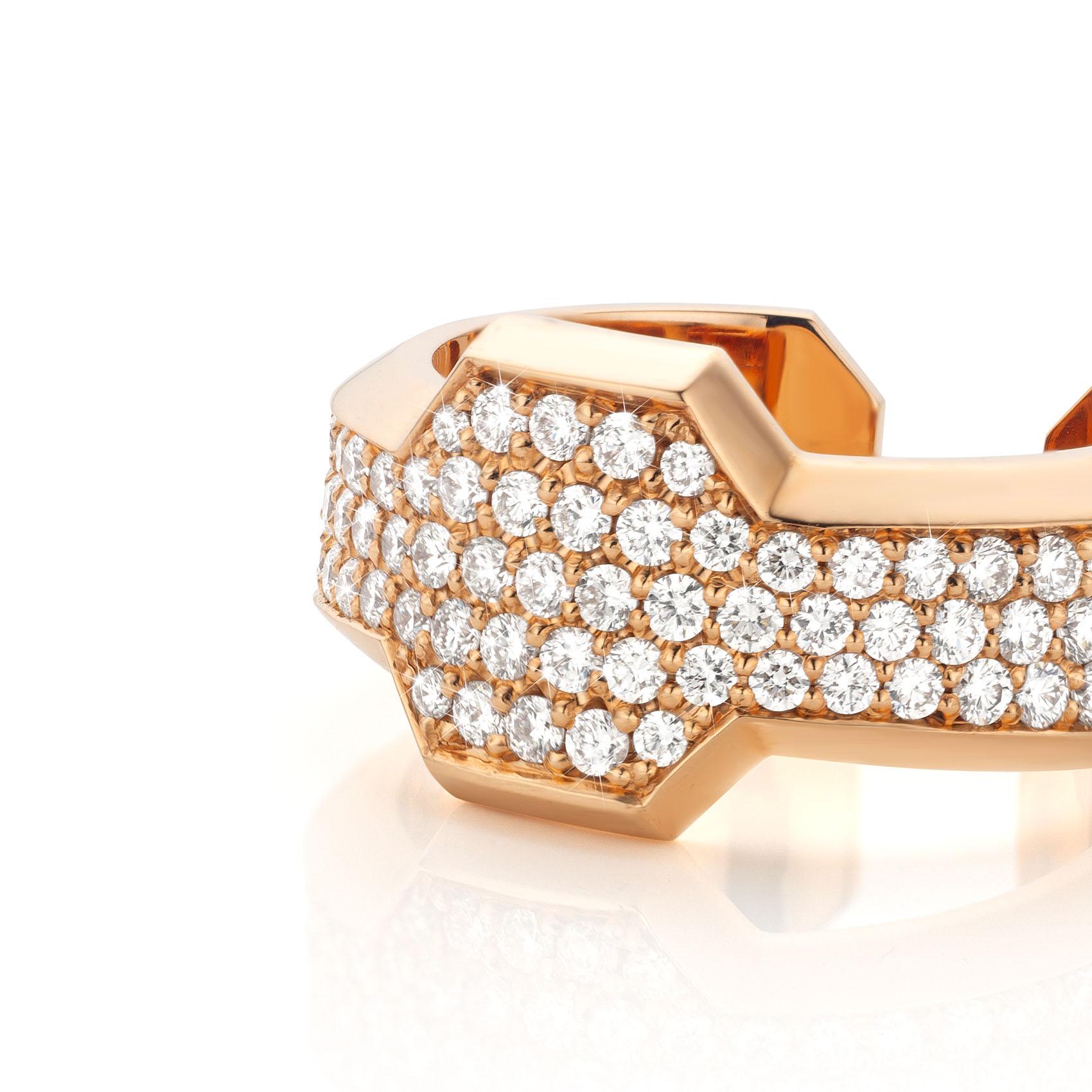 18 Karat Rose gold Ring featuring 1.03 Carat brilliant cut White Diamonds.

This design is one of Jochen Leen's newest designs and is highly recognizable.
This ring is well suited to be worn as an every day ring and is easy to match with other