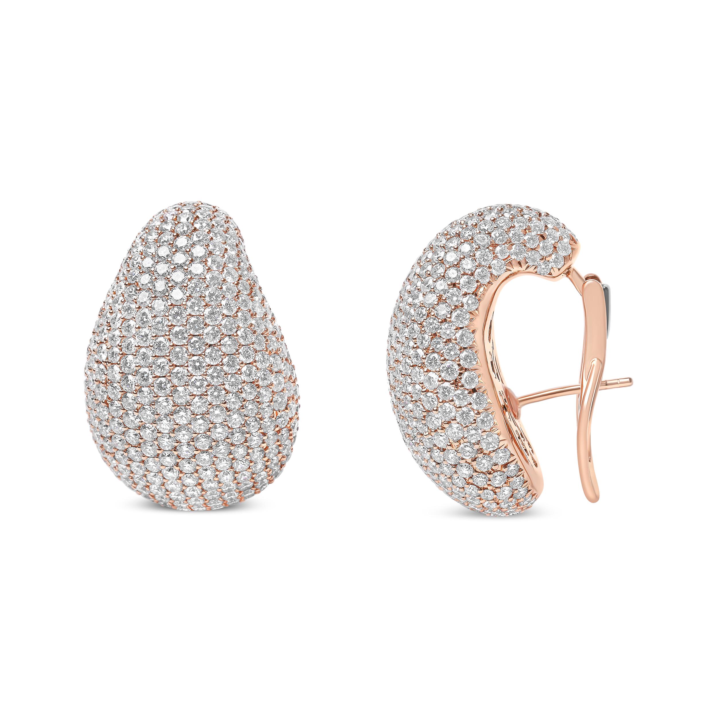 Drenched in the brilliant sparkle of over 675 total diamonds, these sculptural stud earrings display their dazzling wealth in pave settings in an all-over design of ultimate glamour. Crafted of genuine 18k rose gold, these domed earrings exude